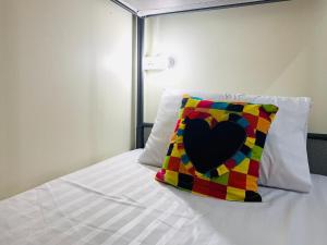 Postel nebo postele na pokoji v ubytování Baan Mae Somkid Homestay