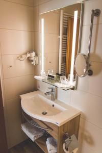 Ein Badezimmer in der Unterkunft Blochums Gasthof Hirsch