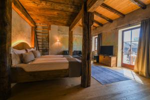 Postel nebo postele na pokoji v ubytování rössl bianco b&b&b