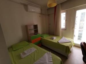 Postel nebo postele na pokoji v ubytování Çanakkale Kampüs Pansiyon