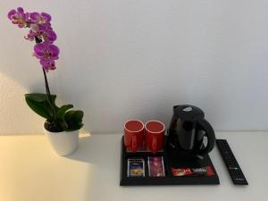 Kohvi ja tee valmistamise võimalus majutusasutuses Hotel B54 Heidelberg City Center