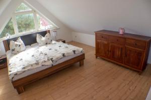 Ein Bett oder Betten in einem Zimmer der Unterkunft Ferienwohnung Ostseefeeling 3