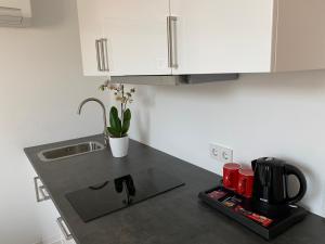 Köök või kööginurk majutusasutuses Hotel B54 Heidelberg City Center