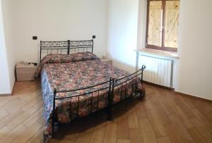 Postel nebo postele na pokoji v ubytování Locanda Dl'Angel