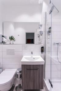 Ванная комната в Hotel B54 Heidelberg City Center