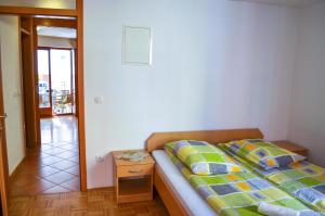 Postel nebo postele na pokoji v ubytování Seaside Apartments Izola