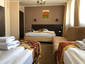 Postel nebo postele na pokoji v ubytování Atlas Berlin Hotel