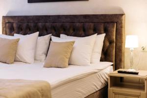 Кровать или кровати в номере Отель Дубрава