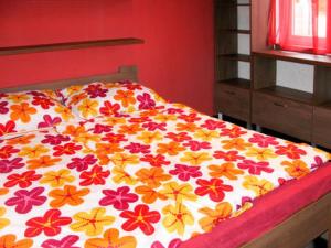 A bed or beds in a room at Ferienhaus Judit