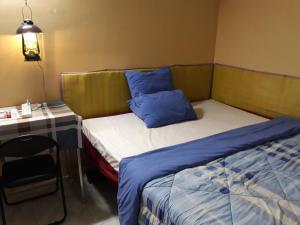 Letto o letti in una camera di Vanny's Peaceful Guesthouse