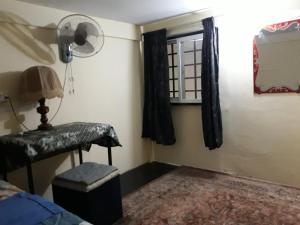 Letto o letti in una camera di Vanny's Peaceful Guesthouse
