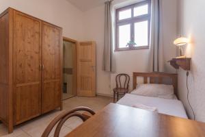 Postel nebo postele na pokoji v ubytování Penzion a restaurace U Hájků