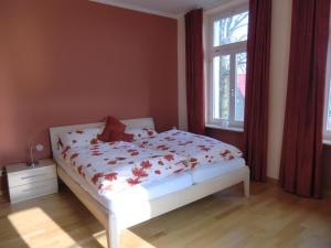 Postelja oz. postelje v sobi nastanitve Ferienwohnung Ostseeglück in der Villa Marie
