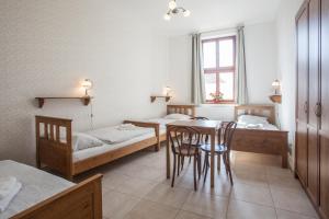 Postel nebo postele na pokoji v ubytování Penzion a restaurace U Hájků