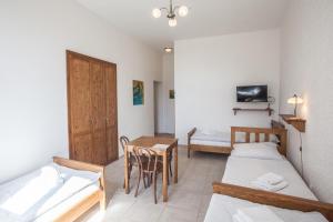 Postel nebo postele na pokoji v ubytování Penzion a restaurace U Hájků