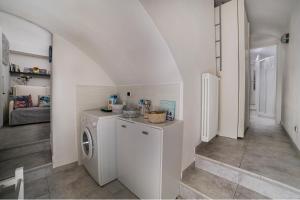 A kitchen or kitchenette at La Magnolia, Caressa de mä