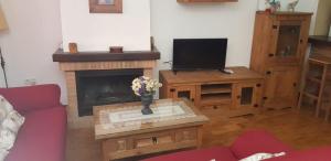 A television and/or entertainment centre at Casita de Rosario