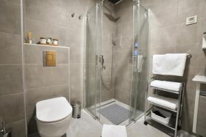Kylpyhuone majoituspaikassa Apartman Silver Lux
