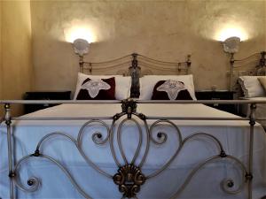 Кровать или кровати в номере A locanda tu marchese
