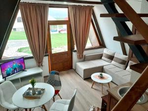 Posezení v ubytování Eco Village Pavlovic