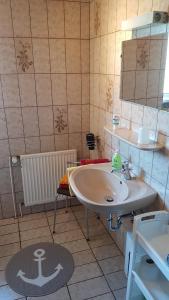 Kúpeľňa v ubytovaní Hausnordlicht FEWO 4