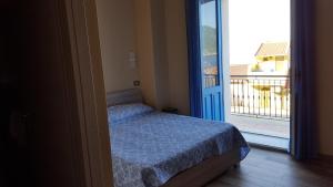 Postel nebo postele na pokoji v ubytování seaside room