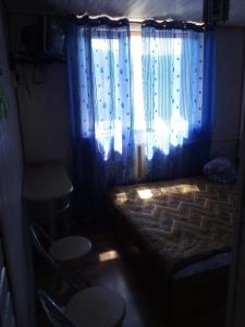 Ein Sitzbereich in der Unterkunft Rukavychka
