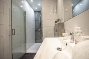 Kúpeľňa v ubytovaní Apartamenty AP 11 + 8 fotografií