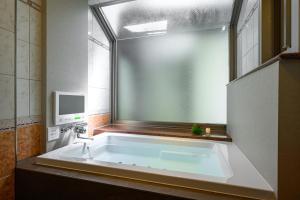 Koupelna v ubytování HOTEL C.KOHOKU