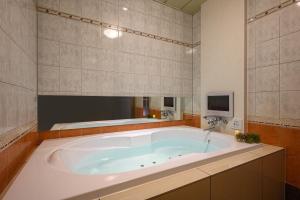 TV a/nebo společenská místnost v ubytování HOTEL C.KOHOKU