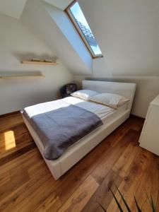 Ein Bett oder Betten in einem Zimmer der Unterkunft Villa ENERGY