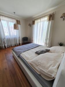 Posteľ alebo postele v izbe v ubytovaní Villa ENERGY