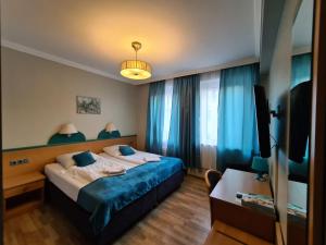 Voodi või voodid majutusasutuse Hotel Cara Vita Cologne toas