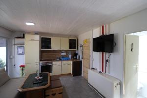 Küche/Küchenzeile in der Unterkunft Haus am See - KEK4