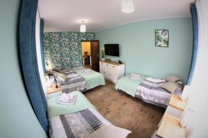 TV/trung tâm giải trí tại Apartamenty Zielone Centrum