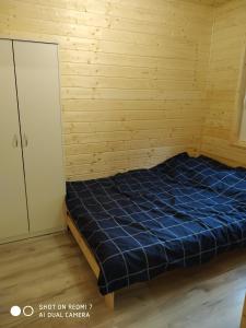 Posteľ alebo postele v izbe v ubytovaní Domki na lipowej + 23 fotografií
