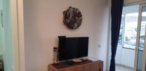 A television and/or entertainment centre at Sweet House