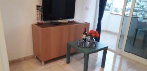 A television and/or entertainment centre at Sweet House