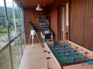 a view of a video game in a room at Chalet dans village in Saint-Maurice-en-Trièves
