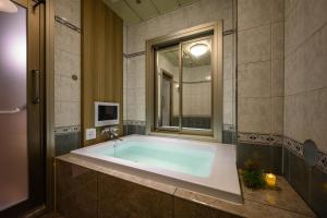 Koupelna v ubytování HOTEL C.KOHOKU