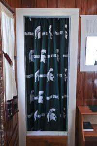 Gallery image of Cabin #1 - Cedar Village cabin in Carp Lake