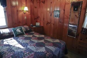 Gallery image of Cabin #1 - Cedar Village cabin in Carp Lake