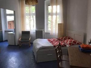 A bed or beds in a room at Klein App in Alt - Tegel