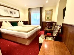 A bed or beds in a room at Villa Turnerwirt