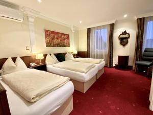 A bed or beds in a room at Villa Turnerwirt
