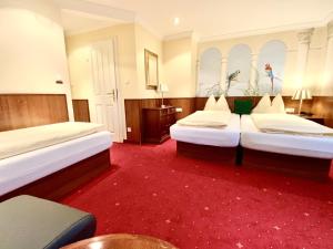 A bed or beds in a room at Villa Turnerwirt