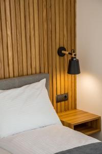 Łóżko lub łóżka w pokoju w obiekcie Apartos Sailor - Luxury Apartments