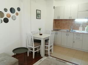 Kuchyň nebo kuchyňský kout v ubytování Apartman Nensy + 7 fotografií