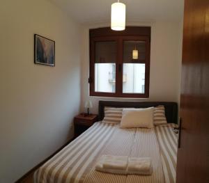 Ліжко або ліжка в номері Apartman Nensy
