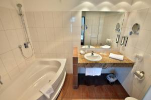 Koupelna v ubytování Hotel Wiehen-Therme